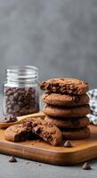 Delicious Double Chocolate Chip Cookies on Wooden Board photo