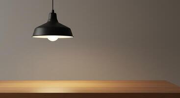 A black light bulb hanging from a wooden table photo