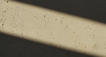 A shadow of a person standing in front of a wall photo
