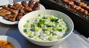 Delicious Grilled Kebabs with Creamy Cucumber Salad photo