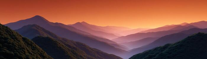 Dusk mountain view soft orange light landscape photography serene environment wide angle photo