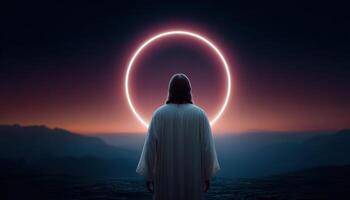 Jesus surrounded by glowing halo in tranquil nature landscape at dusk photo