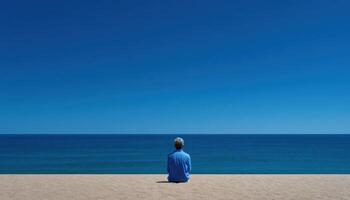 Solitary reflection on a calm beach serene ocean view tranquil environment peaceful scene photo