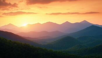 Golden sunrise over misty mountain ranges nature landscape view tranquil morning atmosphere photo