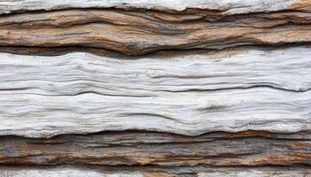 Weathered wooden plank texture revealing grain and knots in rustic environment photo