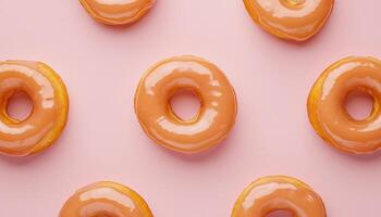 Glazed doughnuts with soft shine on pink background food photography vibrant texture photo
