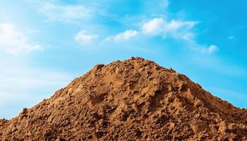Construction site soil mound ready for foundation urban area landscape view building preparation photo