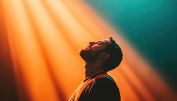 Person praying under shining light rays spiritual setting emotional content uplifting perspective photo