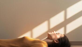 Person laying on floor in natural light indoor setting artistic composition photo