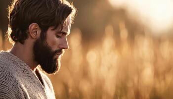 Jesus praying in tranquil sunlit field peaceful scene natural setting reflective moment photo