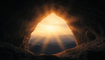 Cave entrance illuminated by sunlight ancient human silhouette natural landscape mystical environment photo