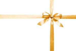 Gold ribbon bow isolated white background. empty space design photo