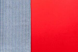 top view blue kitchen napkin isolated on table background. Folded cloth for mockup with copy space photo