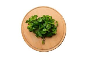 Fresh mint on Cutting board table isolated on white background, top view. Flat lay Space for text photo