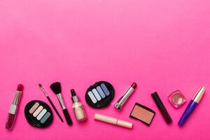 Professional makeup tools. decorative cosmetics. Makeup brushes set and color eyeshadow palette table background. photo