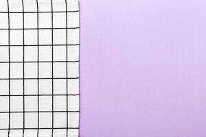 top view with white empty kitchen napkin isolated on table. Folded cloth for mockup photo