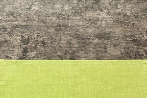 top view green kitchen napkin isolated table background. Folded cloth for mockup with copy space, Minimal style photo