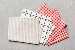 top view with gray kitchen napkin isolated on table background. Folded cloth mockup copy space photo
