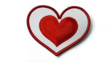 Red heart embroidered patch on white background. photo