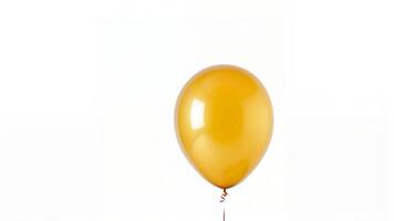 Single golden balloon floating against white background. photo