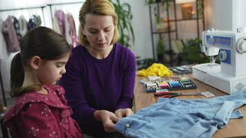 Crafting memories through sewing lessons at home with family video