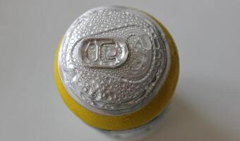 Top view of a tin can after freezing with droplets of condensate photo