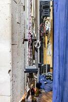 ropes and mechanisms for raising the curtain behind a theatre stage photo