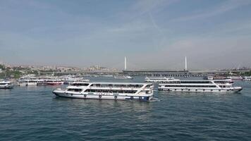 turkey istanbul 17 may 2025, Boats navigate busy waterway in urban setting video