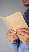 Man reflects with a notebook in a quiet moment video