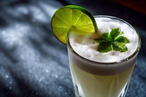 Close-up of a Pisco Sour cocktail photo
