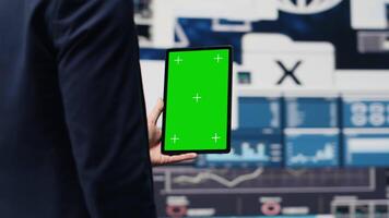 Entrepreneur holds tablet with copy space screen and leveraging dashboards, finance trends and KPI metrics to optimize corporate performance and plan for future success. Growth planning. Camera A. video