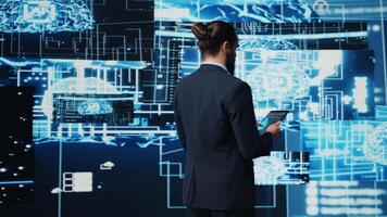 IT specialist interacting with digital AI neural networks for deep learning and algorithmic thinking, ensuring smart tech innovation and future development strategy with science. Camera B. video
