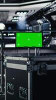 Vertical Close up of green screen tablet inside futuristic spacecraft bay used for monitoring system diagnostics. Chroma key device used for orbital navigation data in space station cockpit video