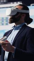 Vertical Business entrepreneur sending a text message with analytics reports, working hard on obtaining maximum performance for activity development success. Management and innovation. Camera A. video
