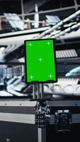 Vertical Mockup laptop in orbital station surrounded by high tech displays tracking Mars telemetry. Green screen notebook enabling real time mission control and spacecraft status updates video