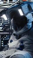 Vertical Researchers flying together in starship exploring Mars planetary surface. Cosmonauts ensuring operational readiness before landing on red planet to study cosmic origins, camera A video
