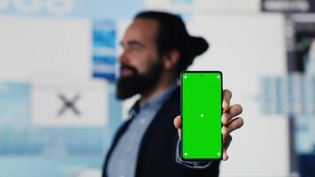 Business director showing chroma key isolated screen for digital analysis, ensures financial planning and business success with digital growth driven tools and monthly reports. Camera A. video