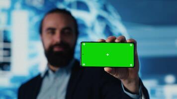 Surrounded by modern AI brain animation, entrepreneur explores virtual intelligence with green screen on device. Using automation platforms for a new innovative IT strategy. Camera A. video