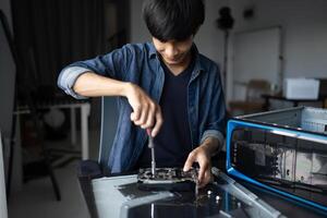 IT Engineer man working on a computer photo