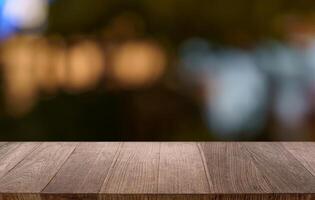 empty wooden table top blurred background. photo