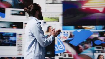 Successful online lifestyle of an influencer checking real time notifications, enjoying interaction with followers and posting creative content in a modern social network environment. Camera B. video