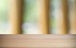 wooden table top on blurred background. photo