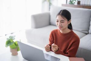 VDO Call Conference Work from home remote work talk chat online on vdo call on laptop webcam conference working with laptop online event briefing E learning and social distancing concept. photo