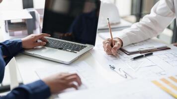 Architecture drawing on architectural project business architecture building construction Colleagues designer Planning blueprint and compasses photo