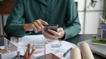 Architecture Man use smart phone for architectural Creative project business architecture ecosystem building construction Industrial engineering photo