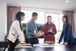 Asian business woman Brainstorm meeting pplication Designers mobile app interface Creative digital development software design project ux ui. photo
