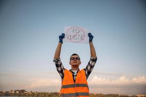 Man volunteer, is ,against, trash pollution outdoors photo