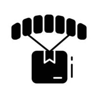An editable glyph icon of parachute delivery vector