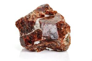 Macro stone Grossular, mineral on white background photo