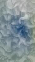 Abstract ethereal backdrop with blue hues and gentle light rays creating a serene and dreamy atmosphere video